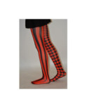 Collant asymétrique rayures et losanges noir rouge
