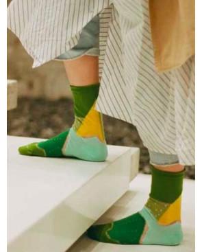 Chaussettes patchwork vert à pois transparents